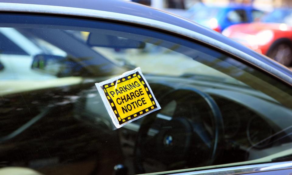 <span>Private parking businesses issued 9.7m tickets between April and December last year.</span><span>Photograph: Lynne Sutherland/Alamy</span>