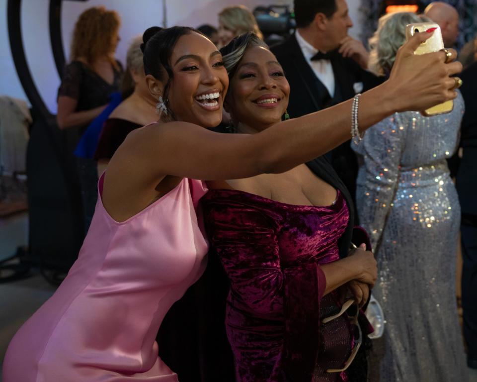 Sassy "Golden Bachelor" star Natascha Hardee poses for a selfie with Tayshia Adams ahead of the wedding ceremony for Gerry Turner and Theresa Nist on Jan. 4, 2024.