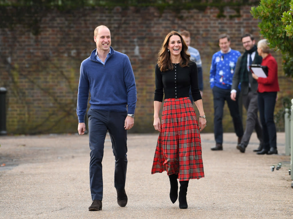 Kate Middleton, Duchess of Cambridge, and Prince William host a Christmas party for families of military personnel at Kensington Palace in London. (Photo: Karwai Tang/Getty Images)