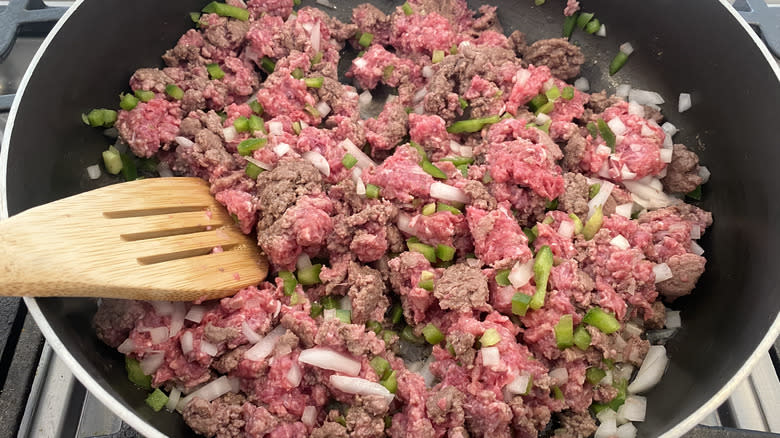 Frying ground beef in pan