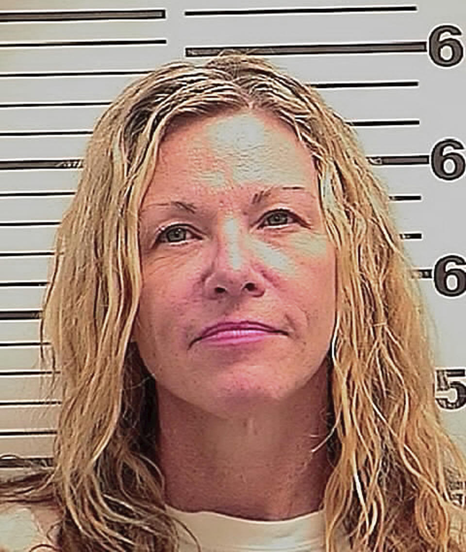 This photo released Friday, March 6, 2020 by the Madison County Sheriff's Office shows Lori Vallow, also known as Lori Daybell. The mother of two children missing for nearly six months had her bond reduced to $1 million Friday during her first court appearance on child abandonment charges in Idaho. Her two youngest children, 7-year-old Joshua "JJ" Vallow and 17-year-old Tylee Ryan, were last seen in September 2019 and police in eastern Idaho say both Lori Daybell and her new husband Chad Daybell have lied about the children's whereabouts. (Madison County Sheriff's Office via AP)