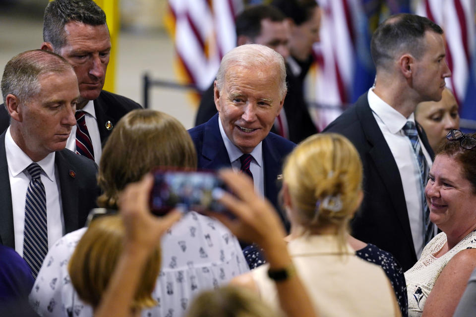 President Joe Biden greets guests after speaking at Auburn Manufacturing Inc., in Auburn, Maine, Friday, July 28, 2023, and signing an executive order to encourage companies to manufacture new inventions in the United States. (AP Photo/Charles Krupa)