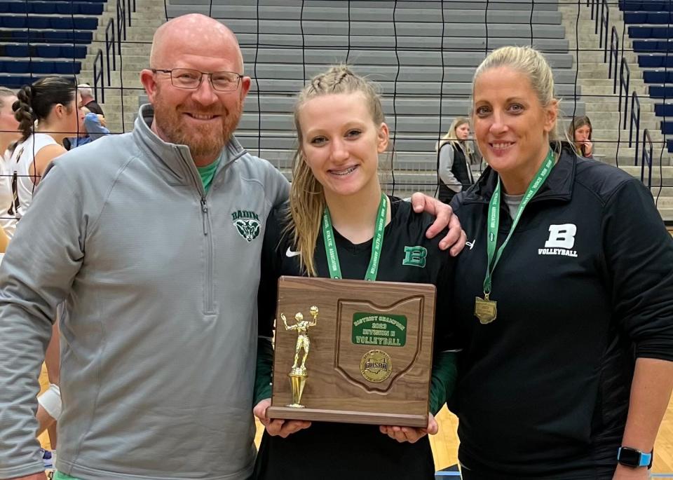 From left, Larry, Elyse and Courtney Weinheimer celebrate Badin’s 2023 Division II district volleyball title.