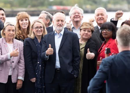 Britain's opposition Labour Party leader Jeremy Corbyn poses with members of his shadow cabinet following their meeting in Salford