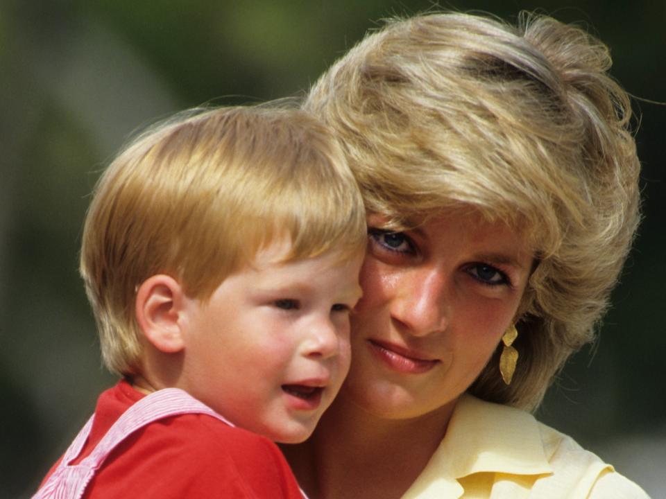 Diana, Princess of Wales with Prince Harry on holiday in Majorca, Spain in 1987.