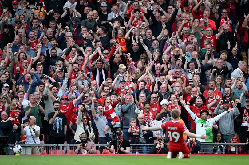 Fans in the Kop End celebrate with Harvey Elliott of Liverpool after he scored the team's fourth goal during the Premier League match between Liverpool FC and Tottenham Hotspur at Anfield on May 05, 2024 -Credit:Photo by Stu Forster/Getty Images