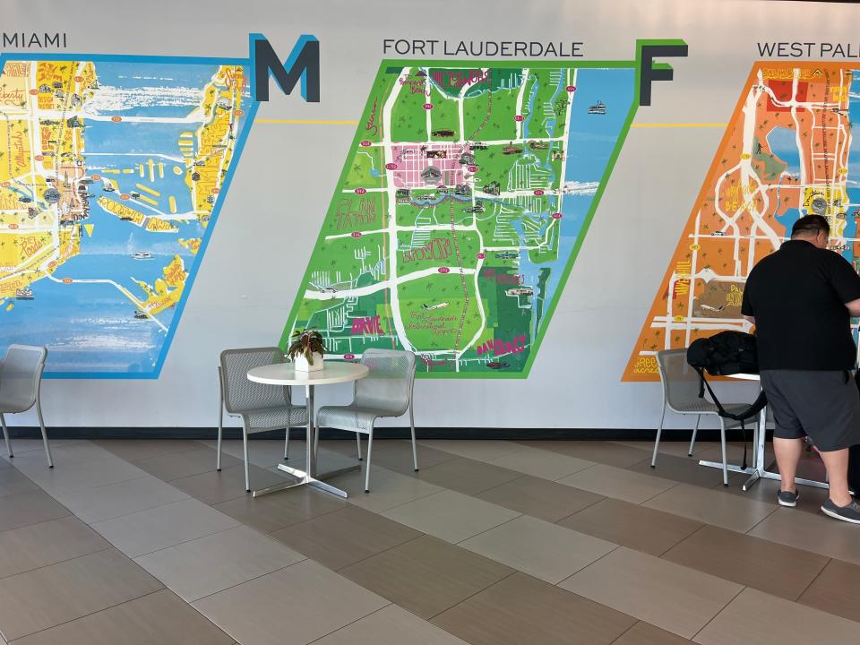Colorful maps of Miami, Fort Lauderdale and West Palm line the walls of the Fort Lauderdale Brightline station.