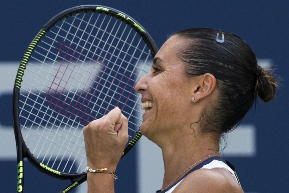 Flavia Pennetta of Italy celebrates after defeating Petra Kvitova of the Czech Republic in their quarterfinals match at the U.S. Open Championships tennis tournament in New York, September 9, 2015.  REUTERS/Adrees Latif