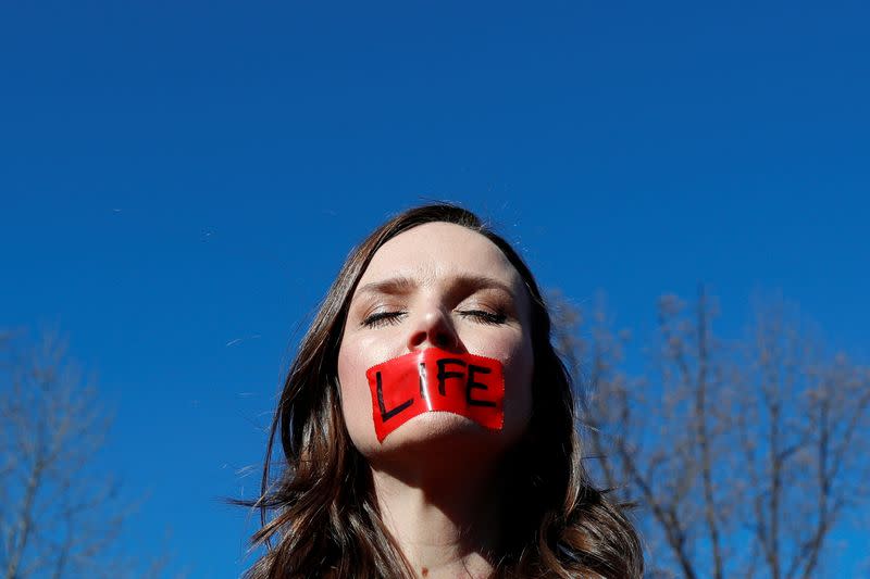 FILE PHOTO: U.S. Supreme Court justices hear a major abortion case on the legality of a Republican-backed Louisiana law that imposes restrictions on abortion doctors, on Capitol Hill in Washington