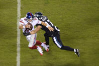 New York Giants' Daniel Jones (8) is tackled by Philadelphia Eagles' Nathan Gerry (47) during the second half of an NFL football game, Thursday, Oct. 22, 2020, in Philadelphia. (AP Photo/Derik Hamilton)