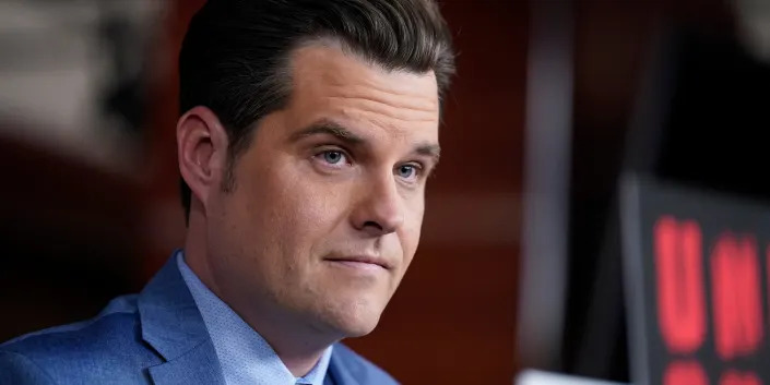 Rep. Matt Gaetz, R-Fla., listens during a news conference at the Capitol in Washington, Tuesday, Dec. 7, 2021.