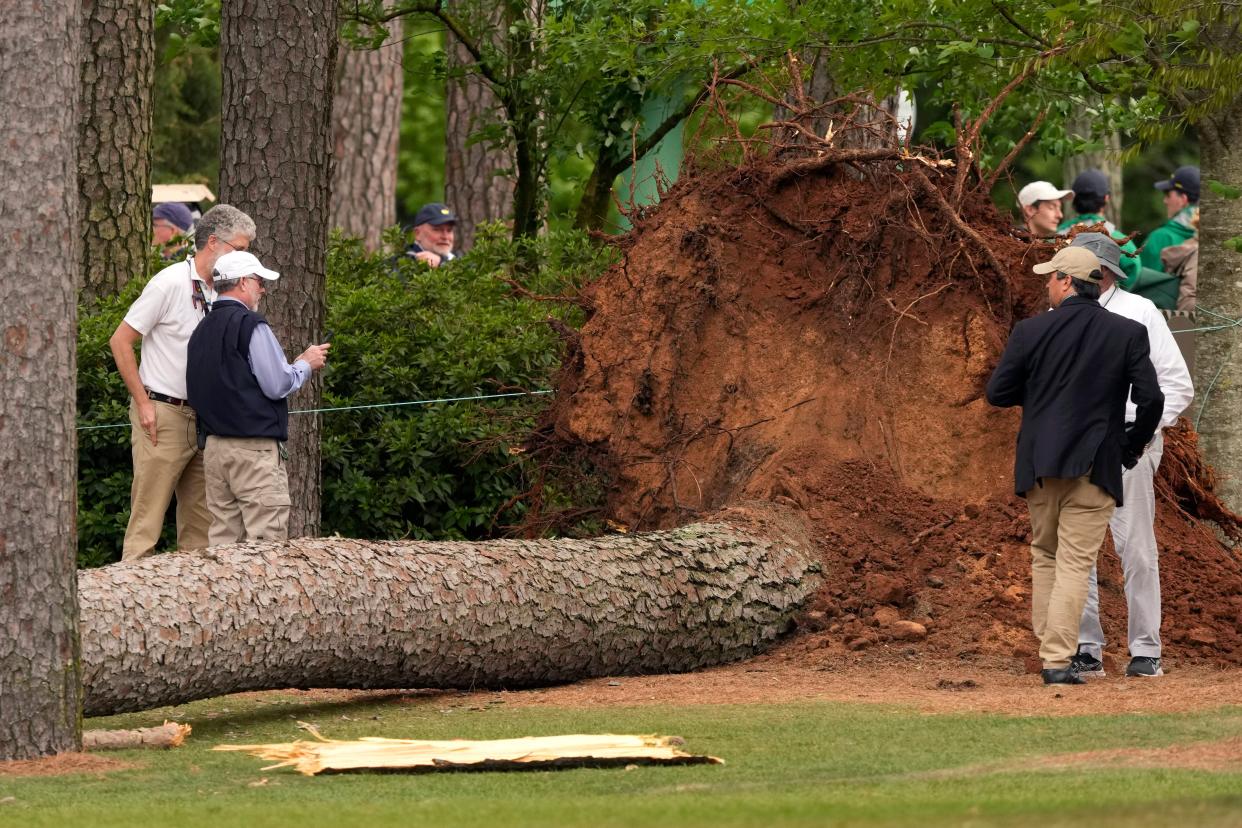 Apr 7, 2023; Augusta, Georgia, USA; Volunteers and staff secure the area around where a tree fell near the 17th tee during the second round of The Masters golf tournament.

Usp Pga Masters Tournament Second Round S Glf Usa Ga