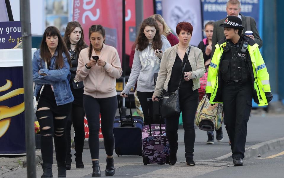 ttendees leave the Park Inn Hotel where they were given refuge after last nights explosion - Credit: Christopher Furlong/Gett