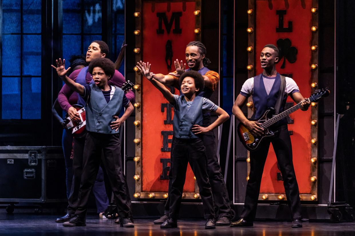 Josh A. Dawson, back left, is seen in "MJ" the musical. Dawson, who grew up in Iowa, will be part of the cast when the musical's tour stops at the Des Moines Civic Center April 29-May 5.