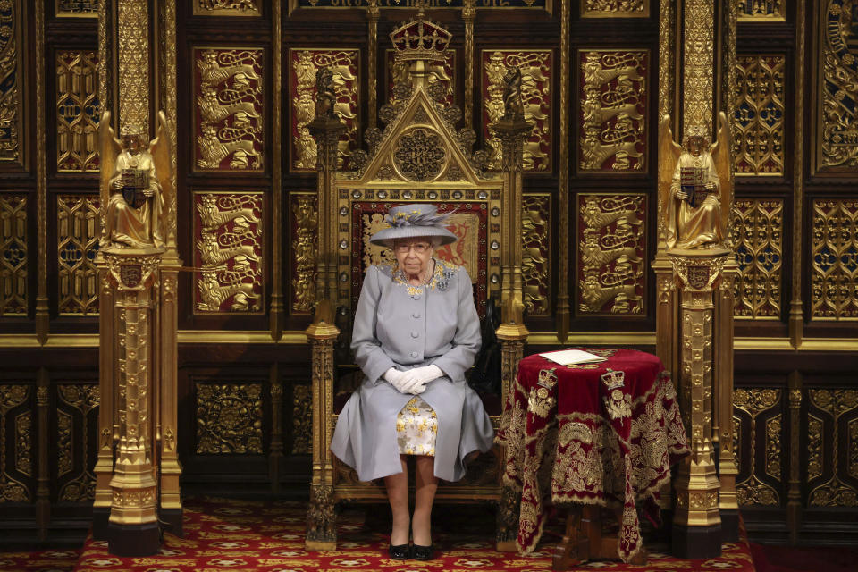 FILE - Britain's Queen Elizabeth II delivers a speech in the House of Lords during the State Opening of Parliament at the Palace of Westminster in London, Tuesday May 11, 2021. On Tuesday, Nov. 7, 2023, King Charles III will sit on a gilded throne and read out the King’s Speech, a list of planned laws drawn up by the Conservative government and aimed at winning over voters ahead of an election next year. (Chris Jackson/Pool via AP, File)