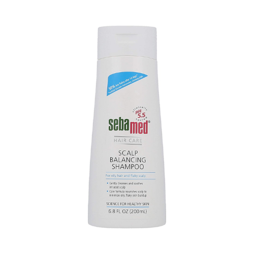 bottle of Sebamed Piroctone Olamine Shampoo against white background