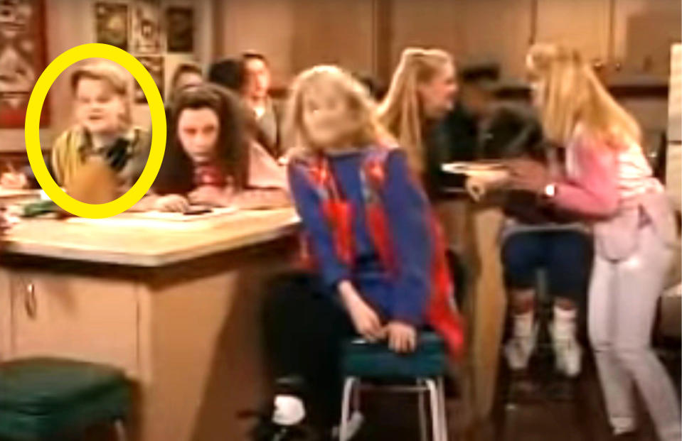 A young Leo circled in a kitchen scene on Roseanne