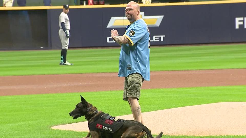 <div>Wayne Blanchard throws out the first pitch, honored as the Brewers "Hometown Hero"</div>