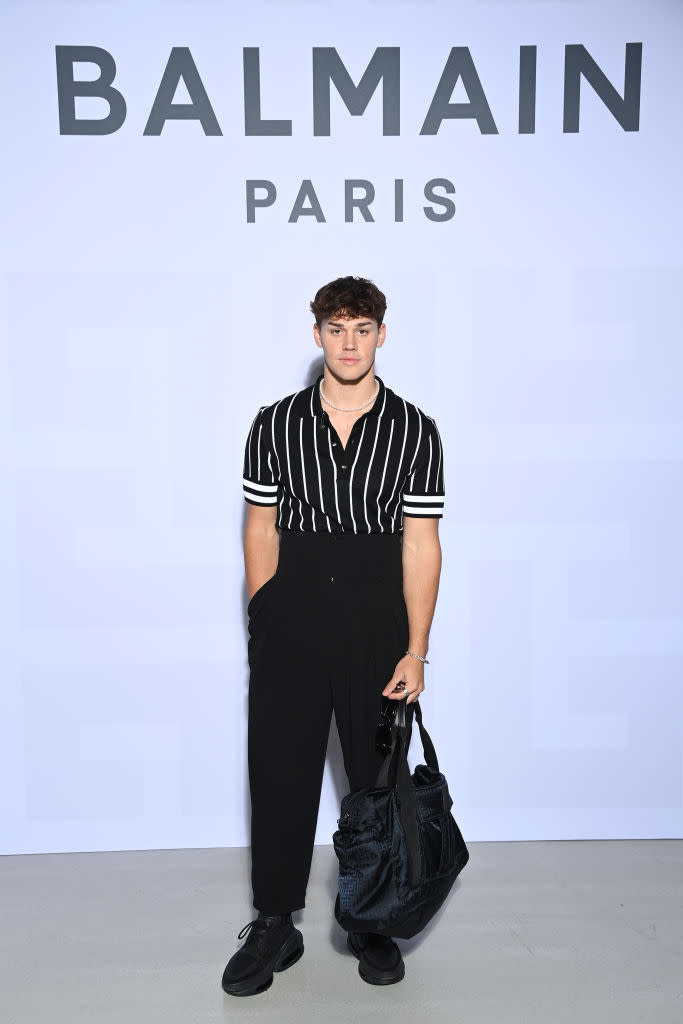 <p>Le footballeur américain, qui cartonne sur Tik Tok, a troqué ses crampons et son maillot contre un look beaucoup plus stylish. Normal quand on est invité au premier rang du défilé Balmain ! ©Getty Images</p> 