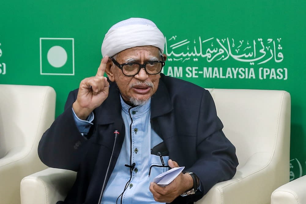 PAS President Datuk Seri Abdul Hadi Awang today called for all political parties to unite and focus on helping the government to combat the Covid-19 situation in the country. — Picture by Ahmad Zamzahuri