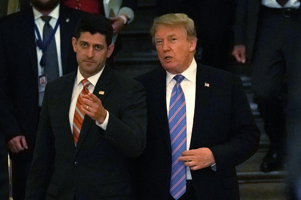 WASHINGTON, DC - JUNE 19:  Accompanied by Speaker of the House Rep. Paul Ryan (R-WI) (L), U.S. President Donald Trump (R) arrives at a meeting with House Republicans at the U.S. Capitol June 19, 2018 in Washington, DC. Trump was on the Hill to discuss immigration with House Republicans.  (Photo by Alex Wong/Getty Images)