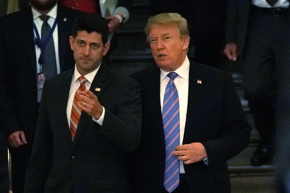 WASHINGTON, DC - JUNE 19: Accompanied by Speaker of the House Rep. Paul Ryan (R-WI) (L), U.S. President Donald Trump (R) arrives at a meeting with House Republicans at the U.S. Capitol June 19, 2018 in Washington, DC. Trump was on the Hill to discuss immigration with House Republicans. (Photo by Alex Wong/Getty Images)