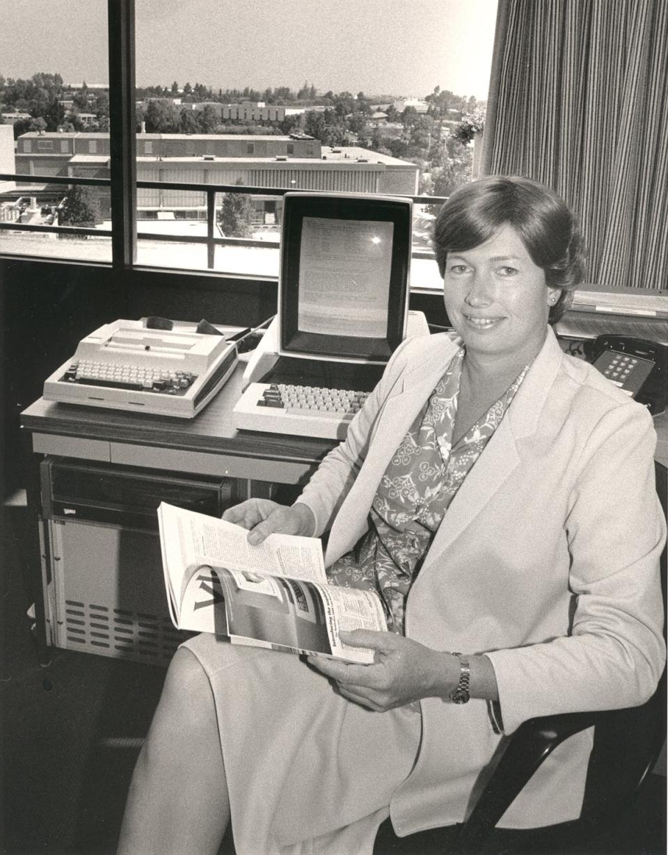 Conway sitting beside her Xerox Alto, an early personal computer developed at at Xerox’s PARC research lab where she worked (Margaret Moulton)