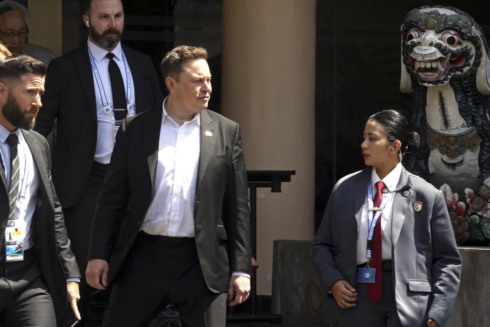 Elon Musk, center, arrives for the 10th World Water Forum in Nusa Dua, Bali, Indonesia on Monday, May 20, 2024. (AP Photo/Firdia Lisnawati)