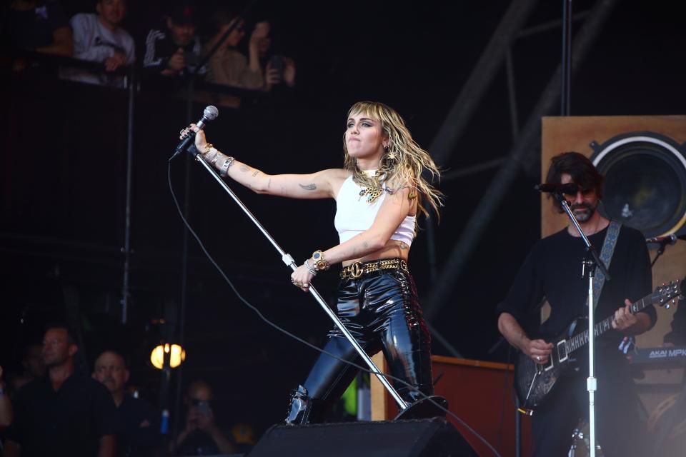 Miley Cyrus performs on the final day of Glastonbury Festival at Worthy Farm, Somerset, England.