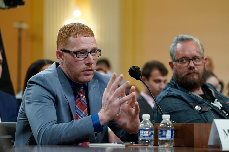 Stephen Ayres (right) testifies during a public hearing before the House committee to investigate the January 6 attack on the U.S. Capitol. Ayres was criminally charged for his actions during the Capitol insurrection. Right is Jason Van Tatenhove is a former spokesperson for the Oath Keepers.