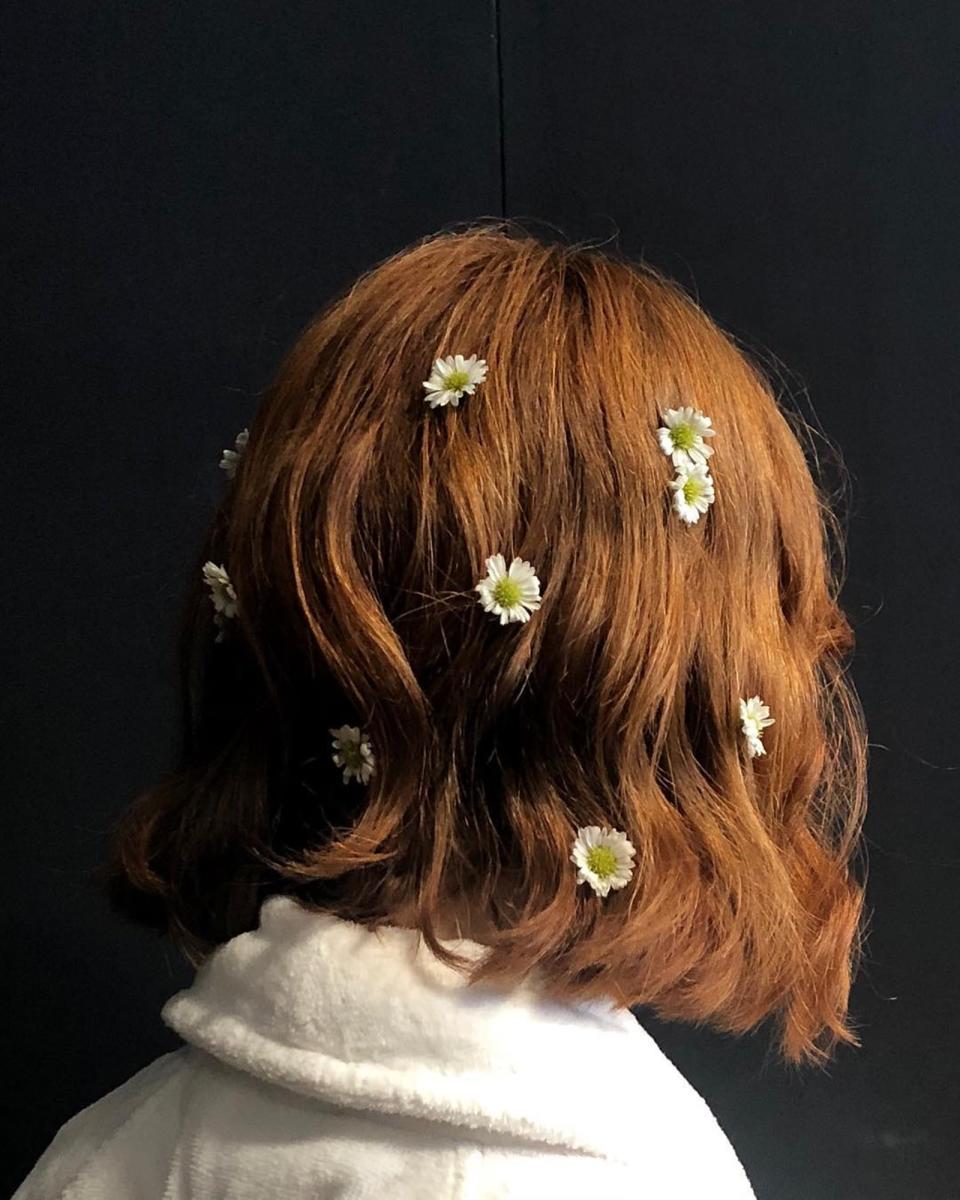 From Rodarte's romantic rose crowns to Dion Lee's lacy body tattoos, six standout beauty moments that took off over the weekend during New York Fashion Week.