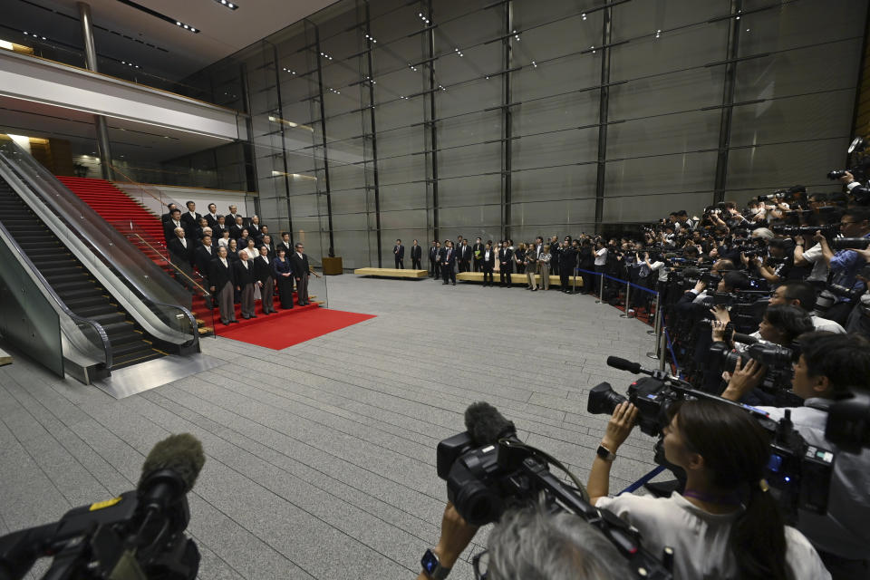 Japanese Prime Minister Fumio Kishida poses with his new cabinet members in Tokyo, Japan, Wednesday, Sept. 13, 2023, after a cabinet reshuffle. (David Mareuil/Pool Photo via AP)