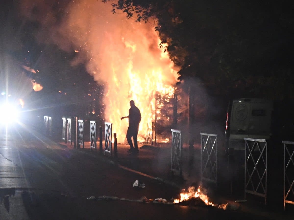 Parts of Nanterre were on fire (EPA)