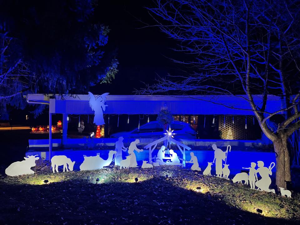 Douglas House-Henry's yard features a large nativity scene. His home is located at 2218 E. Mirabeau St.