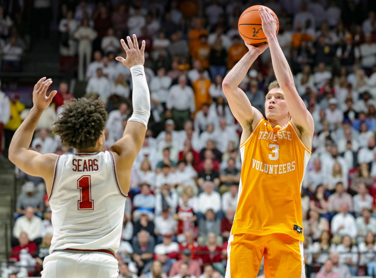 TUSCALOOSA, ALABAMA - MARCH 02: Dalton Knecht #3 of the Tennessee Volunteers puts up a first half shot over top of Mark Sears #1 of the Alabama Crimson Tide at Coleman Coliseum on March 2, 2024 in Tuscaloosa, Alabama. (Photo by Brandon Sumrall/Getty Images)