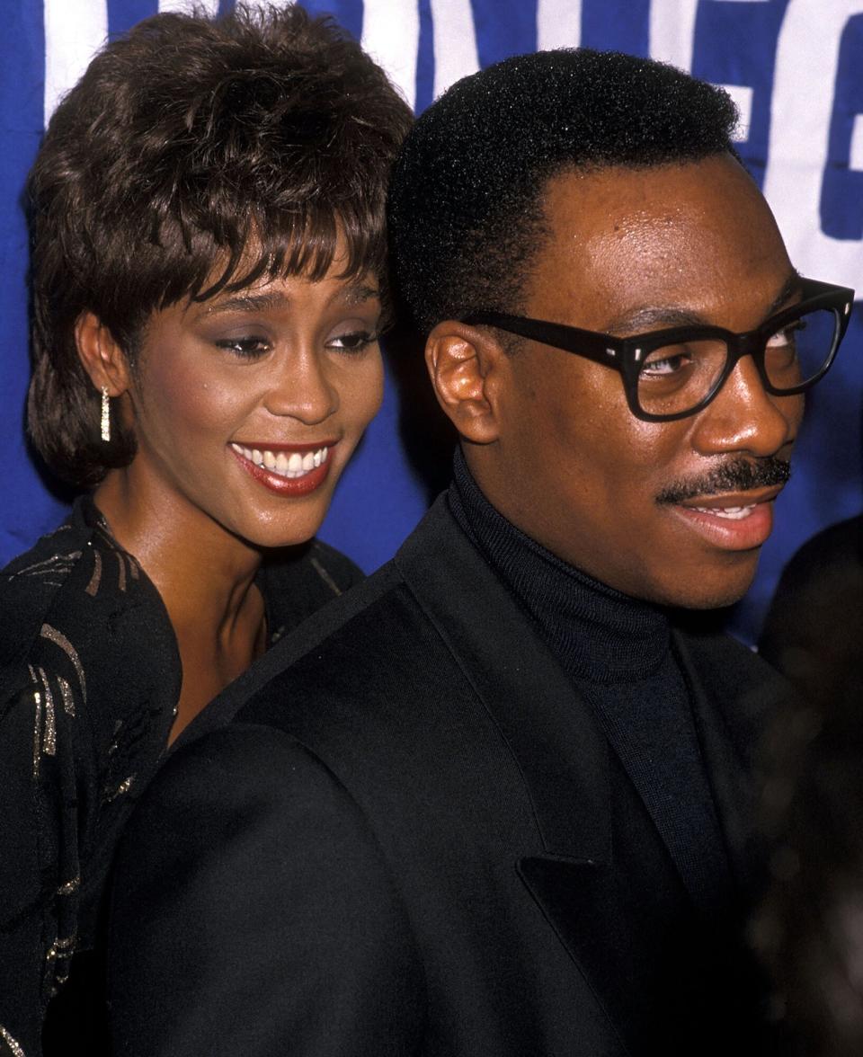 Whitney Houston and comedian/actor Eddie Murphy attend the United Negro College Fund's 10th Annual "Lou Rawls Parade of Stars" Telethon Kick-Off Party on November 15, 1989 at L'Ermitage in Beverly Hills, California