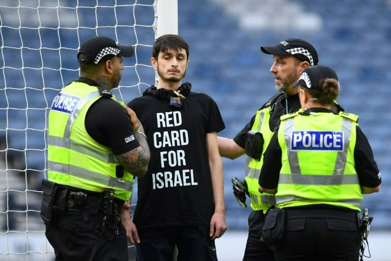 DELAYED: A protester wearing a T-shirt bearing the slogan 