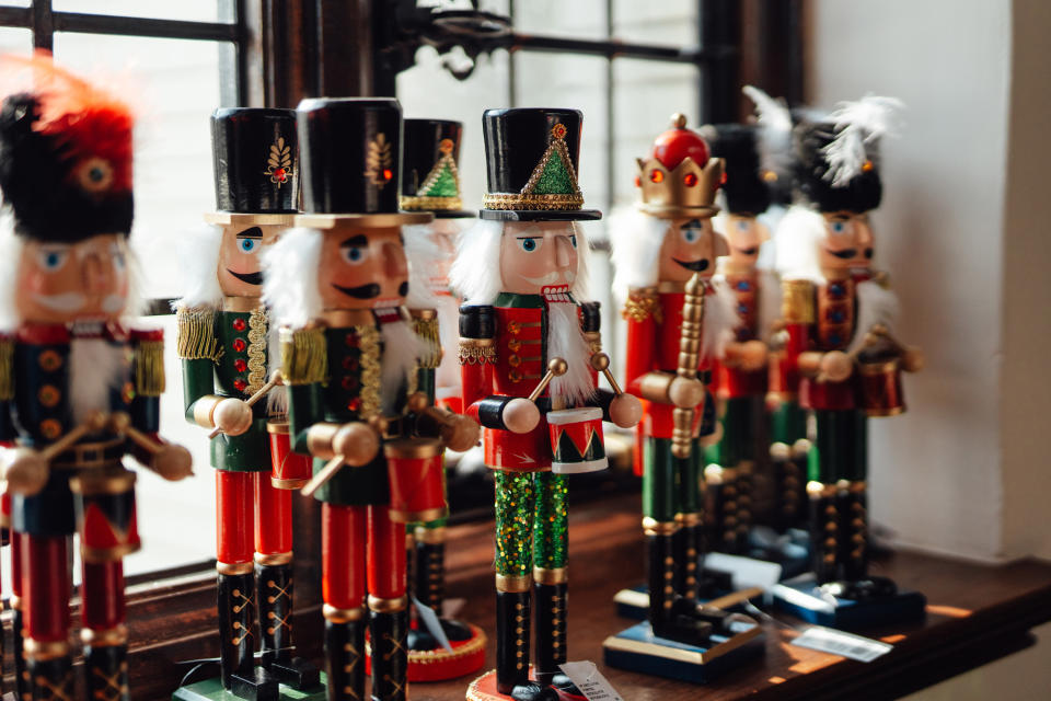 A shelf full of nutcrackers