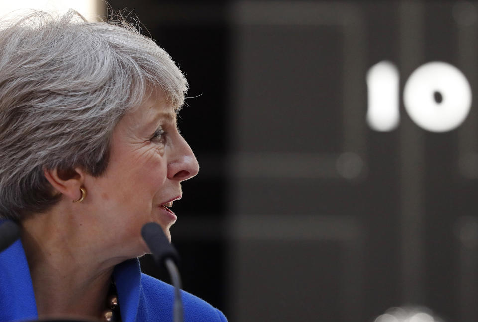 Britain's Prime Minister Theresa May looks around as she speaks outside 10 Downing Street, London before leaving for Buckingham Palace where she will hand her resignation to Queen Elizabeth II, Wednesday, July 24, 2019. Boris Johnson will replace May as Prime Minister later Wednesday, following her resignation last month after Parliament repeatedly rejected the Brexit withdrawal agreement she struck with the European Union. (AP Photo/Frank Augstein)
