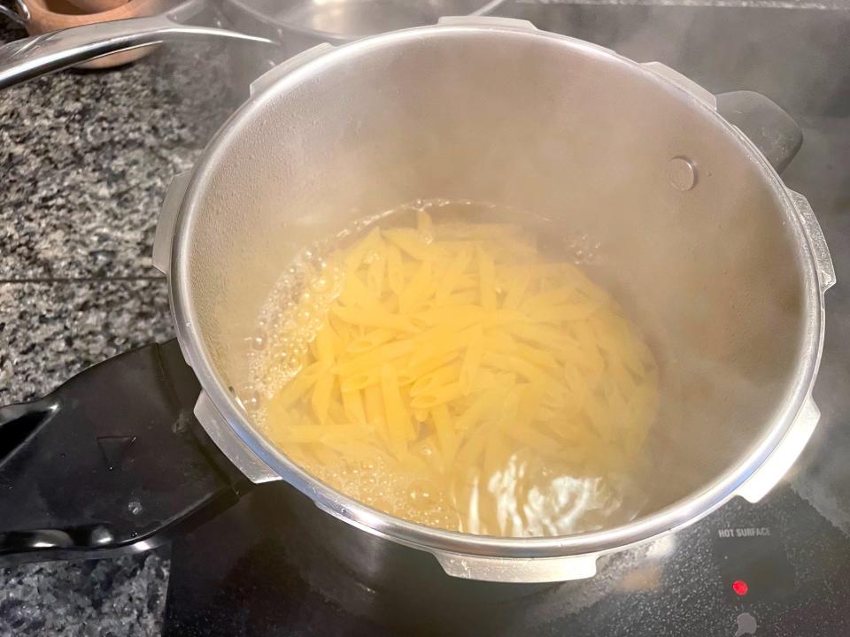 Cooking the pasta for Ina Garten's Penne Alla Vodka