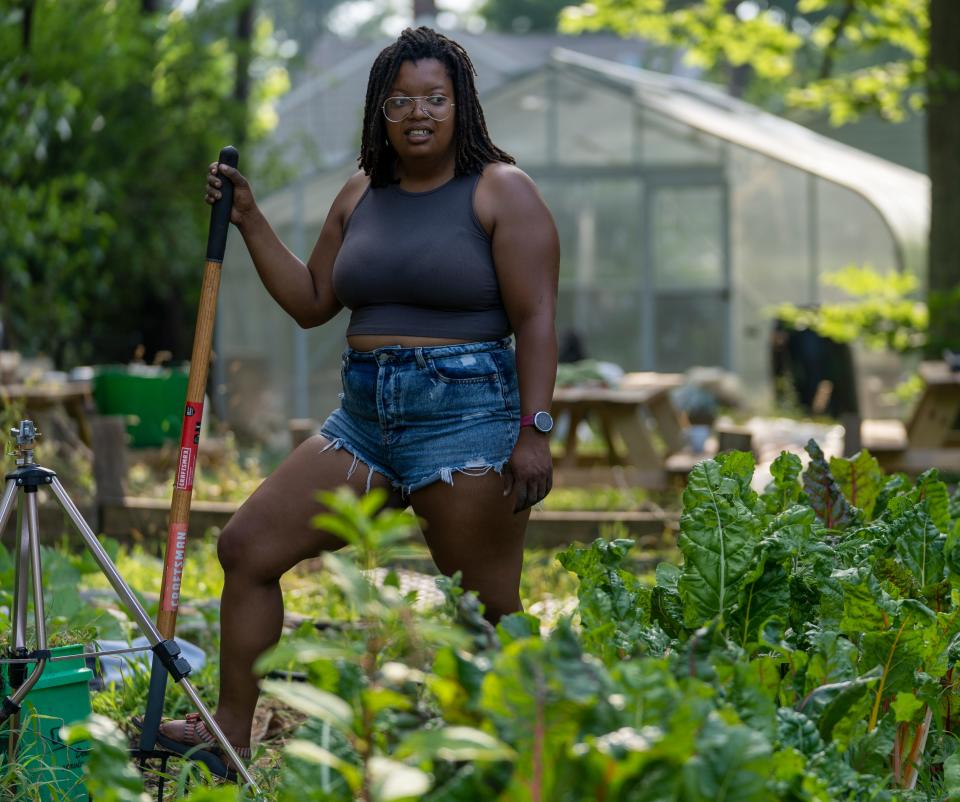 Danielle Guerin prepares for a hard day's work at her farm on the northeast side of Indianapolis, Wednesday, July 6, 2022. This Temple Avenue lot is one of three urban gardens Guerin operates, which also helps teach local young people about farming and life after high school.