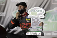 Austin Cindric (22) smiles after winning a NASCAR Xfinity Series auto race Friday, July 10, 2020, in Sparta, Ky. (AP Photo/Mark Humphrey)