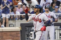 Atlanta Braves' Ozzie Albies celebrates after hitting a two-run home run during the second inning of a baseball game against the New York Mets, Tuesday, July 27, 2021, in New York. (AP Photo/Mary Altaffer)