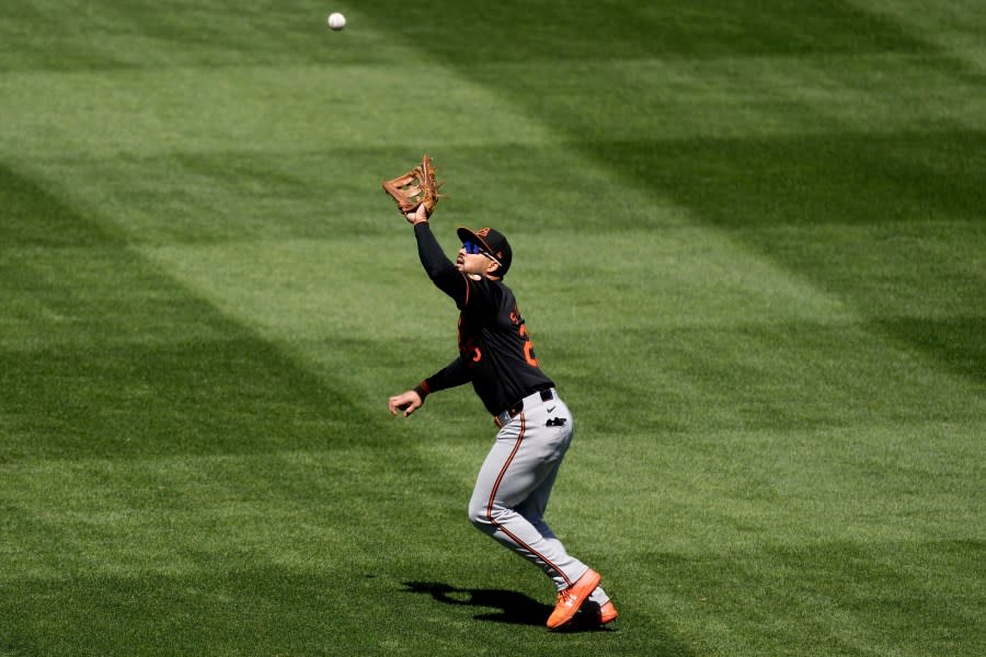 Baltimore Orioles right fielder <a class="link " href="https://sports.yahoo.com/mlb/players/10666/" data-i13n="sec:content-canvas;subsec:anchor_text;elm:context_link" data-ylk="slk:Anthony Santander;sec:content-canvas;subsec:anchor_text;elm:context_link;itc:0">Anthony Santander</a> catches a fly ball for the out on Kansas City Royals’ <a class="link " href="https://sports.yahoo.com/mlb/players/11771/" data-i13n="sec:content-canvas;subsec:anchor_text;elm:context_link" data-ylk="slk:Bobby Witt Jr.;sec:content-canvas;subsec:anchor_text;elm:context_link;itc:0">Bobby Witt Jr.</a> during the fifth inning of a baseball game Sunday, April 21, 2024, in Kansas City, Mo. (AP Photo/Charlie Riedel)