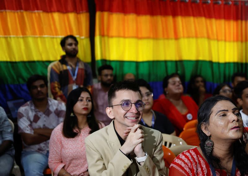 A member of the LGBT community watches the judgement on same-sex marriage by the Supreme Court on a screen at an office in Mumbai
