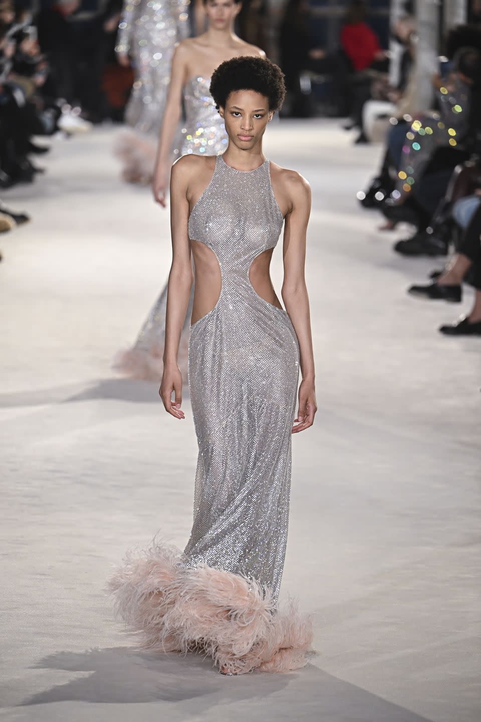 <p>Shimmering sequins, floaty feather trims, and beaded embellishments, oh my! Alexandre Vauthier made his return to the runway after back-to-back seasons of digital shows. Once known for his signature venue of the glimmering Grand Palais, the designer switched things up and took guests on a journey to a warehouse style building on the outskirts of Paris, with booming music that literally made the room shake. Yet the glitter and glamour was all there. Each season one can count on Vauthier for a heavy dose of adornment with a side of toughness, and this collection was no exception. The designer leaned heavily on couture fabrics with his signature ’80s edge that shone through in oversized sweaters dripping in beadwork and baggy, big-shouldered suits, nipped in all the right places. Vauthier is a celeb favorite for good reason, with a huge range of appeal from Rihanna and Miley Cyrus. We have no doubt these pieces will be a hit on the red carpet and elsewhere, especially the glam dresses with plenty of splices running down the sides and the deep cuts of the cool oversized suiting. Each piece had a hint of revealing skin, subtle or not. Will you choose a sheer maxi gown, a ruffled mini dress, or the thigh-high slit when it comes time to go out again? <em>—Kristen Bateman</em></p>