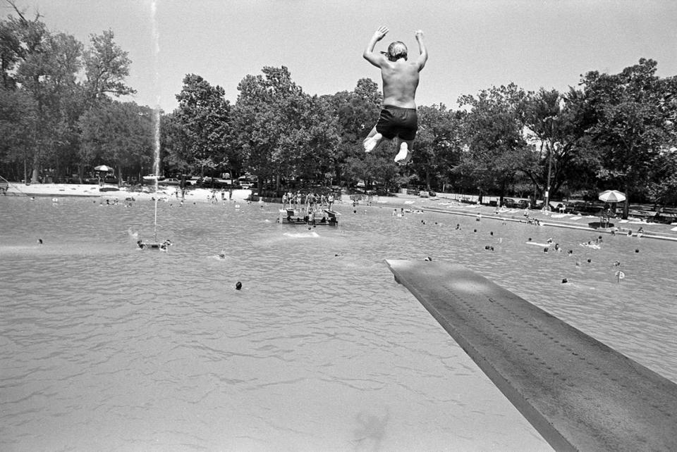 June 25, 1980: A swimmer jumps in off the diving board into Burger’s Lake as Fort Worth reached temperatures over 100 degrees during a heat wave. Paul Iwanaga/Fort Worth Star-Telegram archive/UT Arlington Special Collections