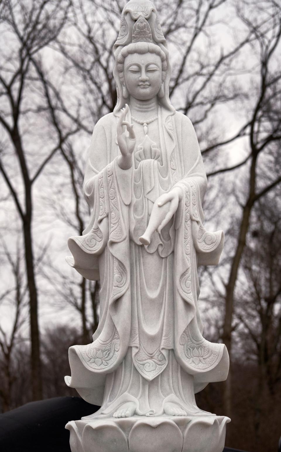 Buddhas are part of the sculpture garden Thursday, Feb. 9, 2023 at Phap An Temple.