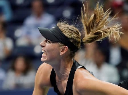 Sept 1, 2018; New York, NY, USA; Maria Sharapova of Russia hits to Jelena Ostapenko of Latvia in a third round match on day six of the 2018 U.S. Open tennis tournament at USTA Billie Jean King National Tennis Center. Mandatory Credit: Robert Deutsch-USA TODAY Sports