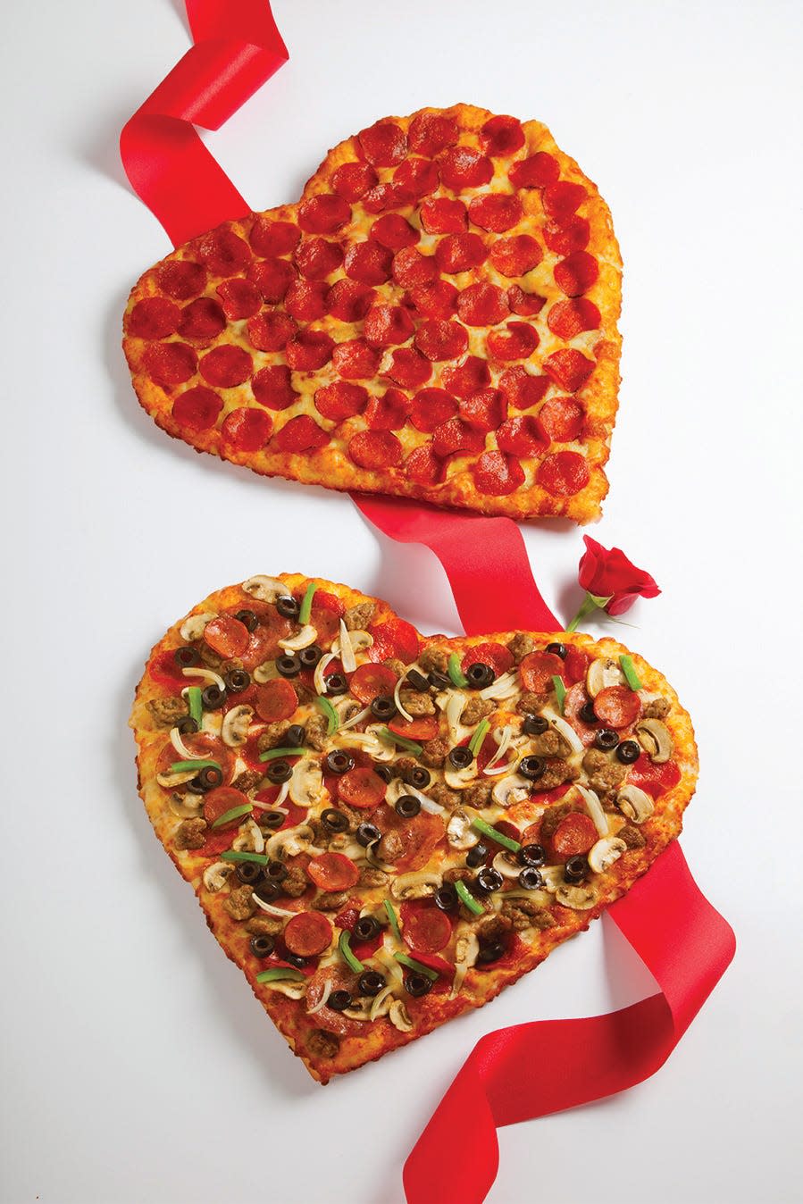 Round Table Pizza is giving customers $5 off any large pizza through Valentine's Day and you can have it made into a heart-shaped pie.